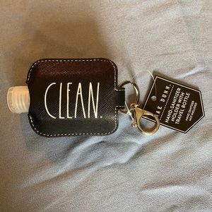 Rae Dunn hand sanitizer holder with travel bottle